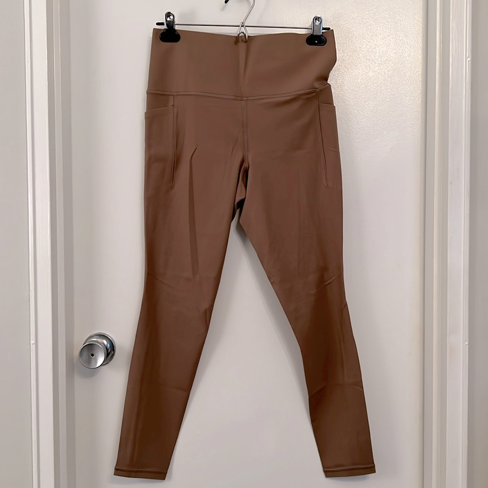 Athleta Salutation Stash Tight